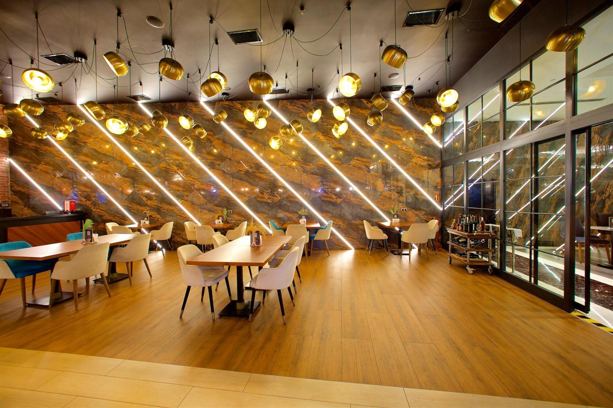 Ramada By Wyndham Istanbul Merter Exterior photo Interior of a restaurant