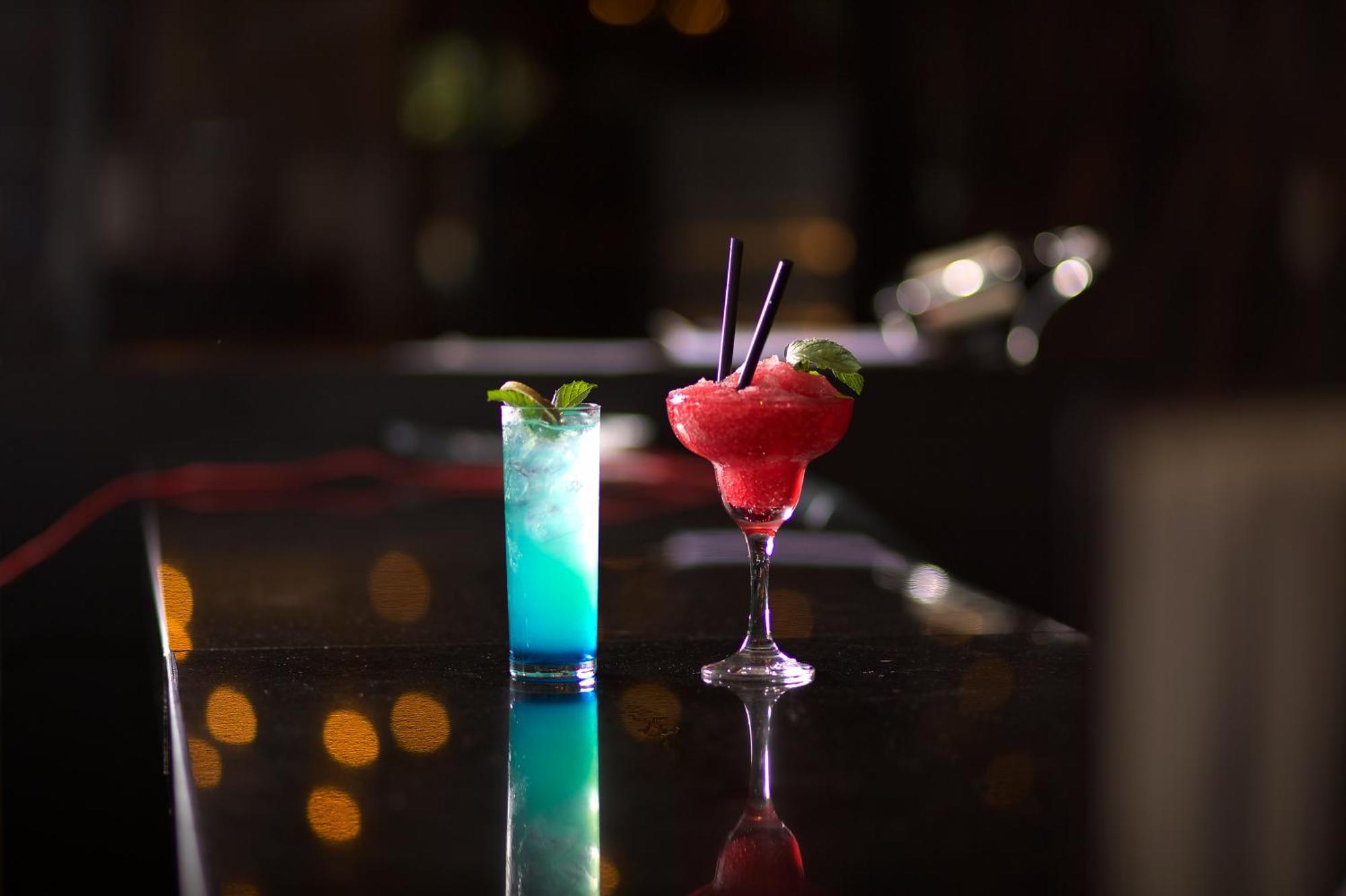 Ramada By Wyndham Istanbul Merter Exterior photo A Blue Hawaii (left) and a strawberry margarita (right)